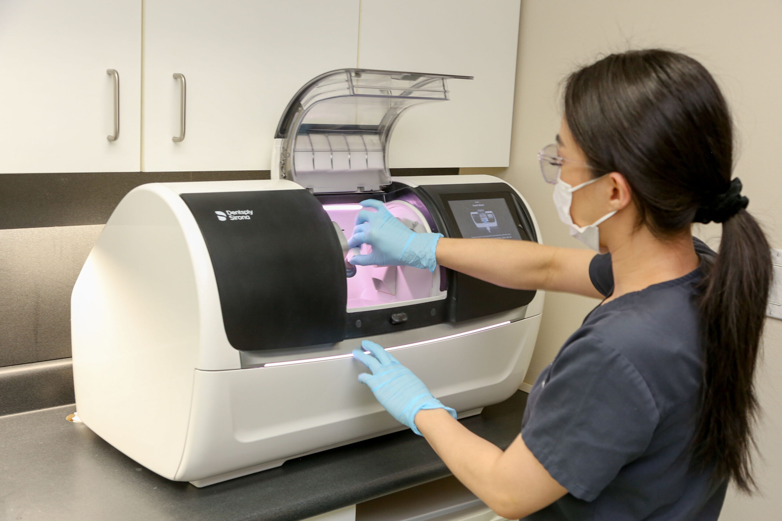 Dental professional using CEREC machine for same day crown treatment at Dentists on Dunbar in Vancouver